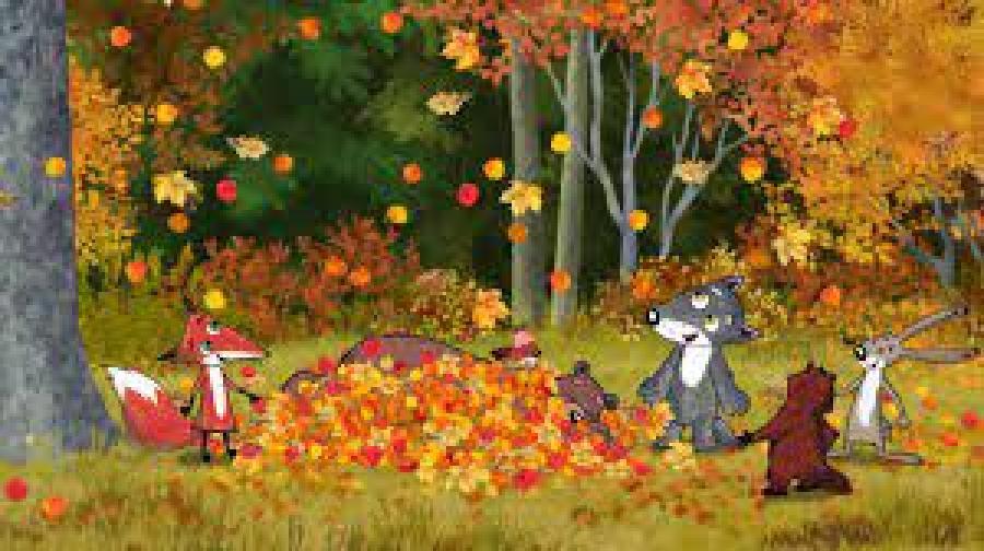 Lille ulv i en skov med efterårets blade